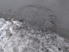 Под давлением снега упал в осадок новый асфальт на севере Волгограда