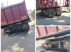 Асфальт разошелся под КамАЗом в Советском районе Волгограда