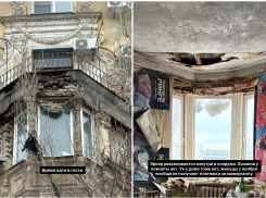 Ничейная квартира осыпается на головы прохожих над входом в притягательное место Волгограда