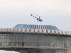 В камеру «Блокнота» попал вертолет над «шайбой» речпорта