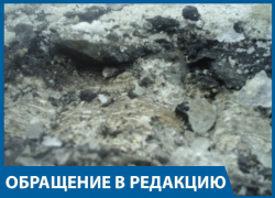 После уборки снега спецтехника расколола асфальт во дворе дома, - волгоградцы